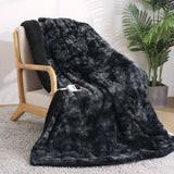 Heated blanket featuring 6 heating levels and stylish tie-dye finish